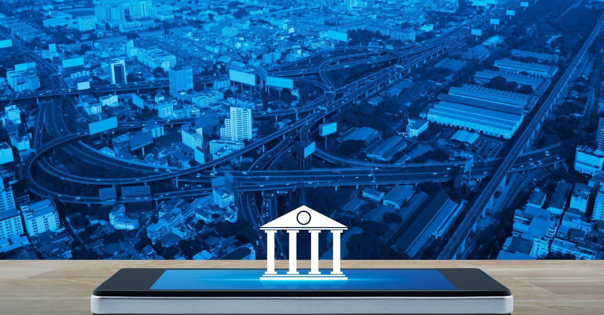 Icono de banco que aparece desde un iphone con fondo azul de paisaje urbano 